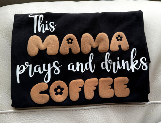 This Mama Prays and drinks coffee T-Shirt